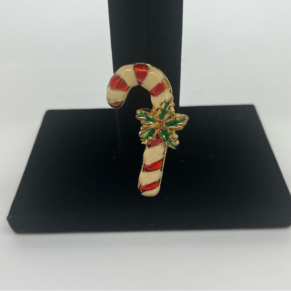 Vintage candy cane pin. Costume Jewelry Enamel, red and white green holly.